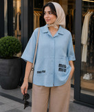 شومیز نیمه آستین زنانه مدل miu miu در کوک مال